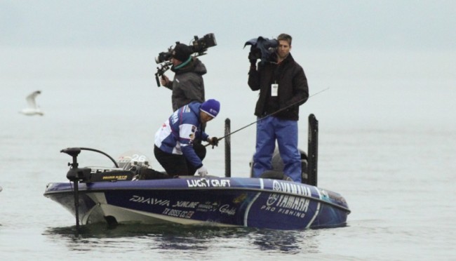 The one thing you can count on, the leader of a Bassmaster Classic will have plenty of cameras on him on the final day.   Photo: Steve Bowman